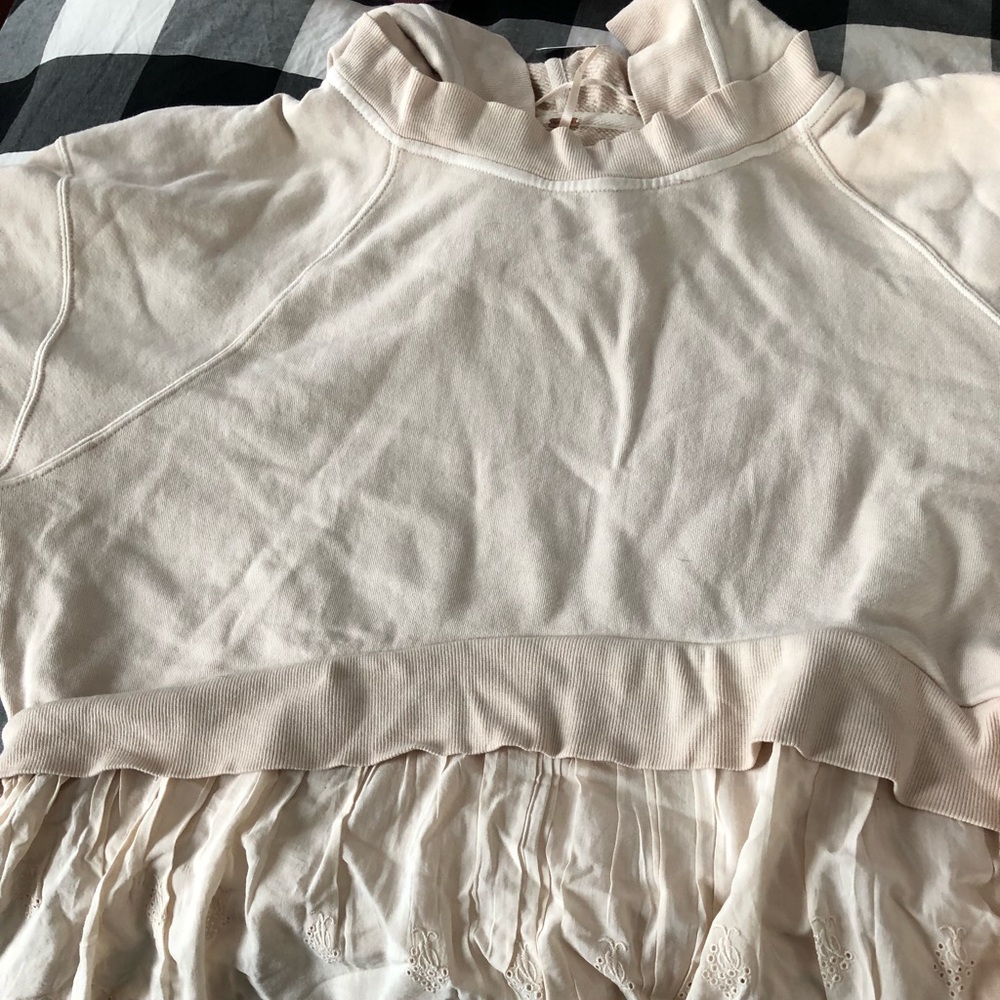 Free People sweatshirt.